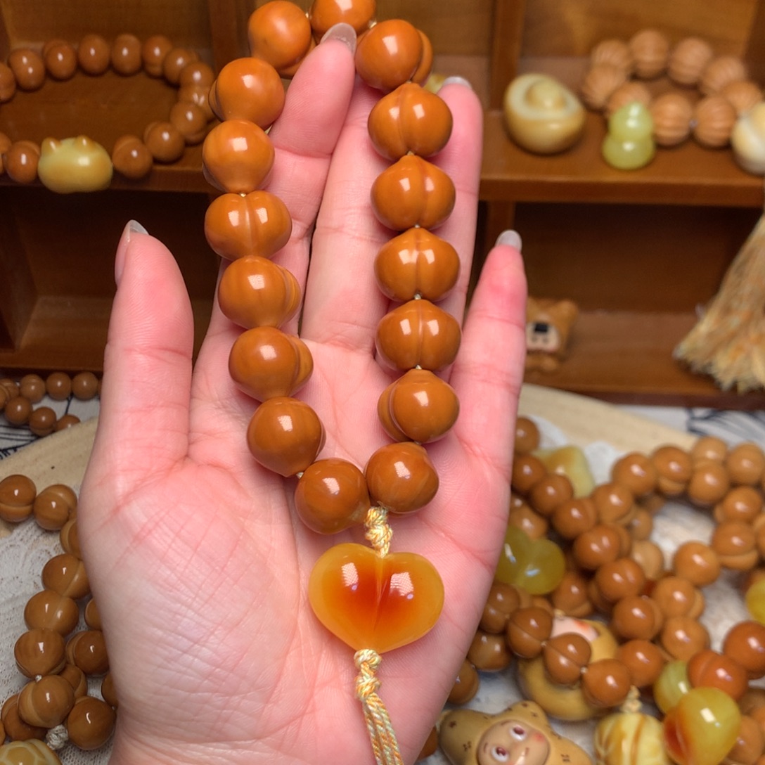 猴头核桃把件17玻璃底屁桃手持爱心