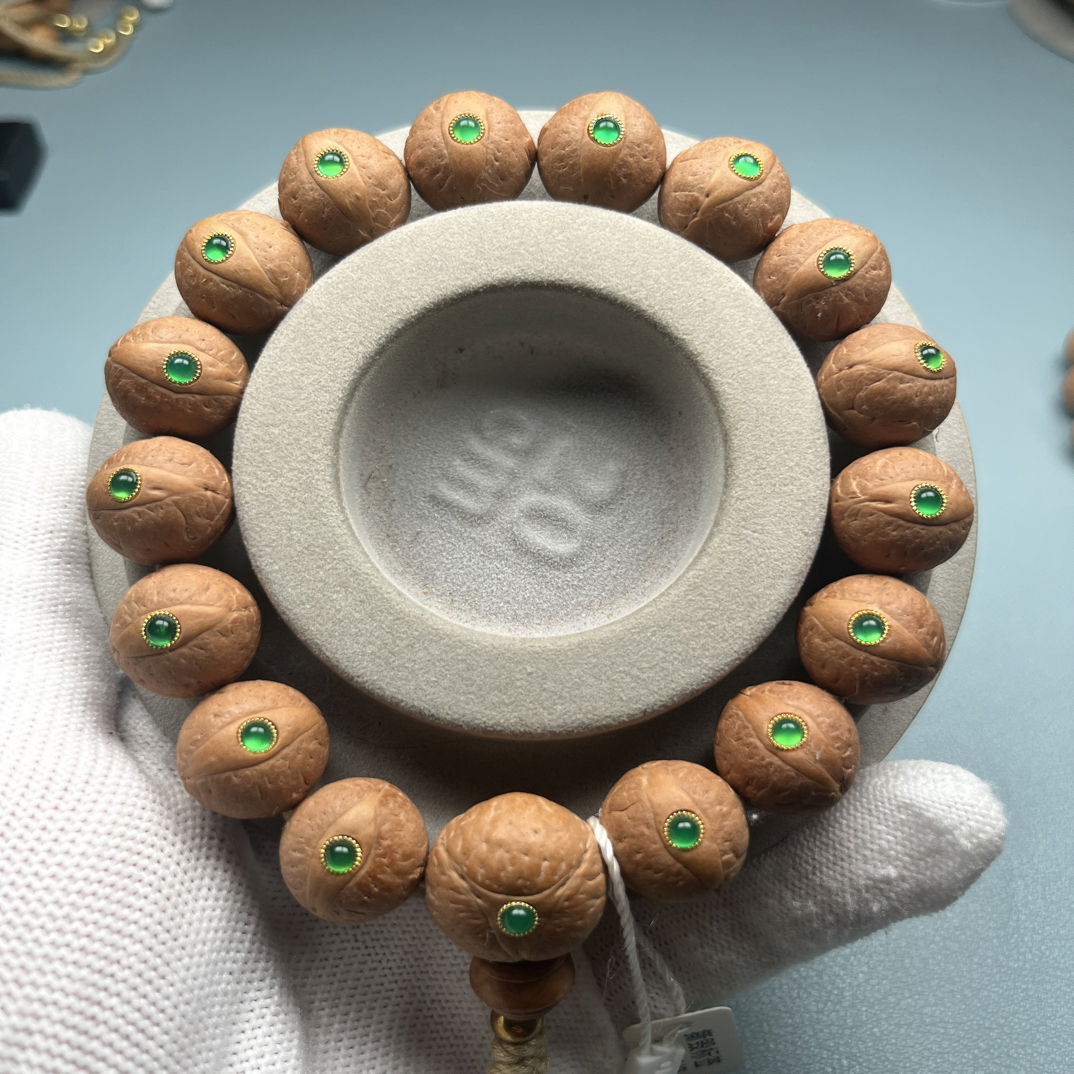 尼泊尔凤眼菩提货头16mm左右手串镶嵌压花绿宝