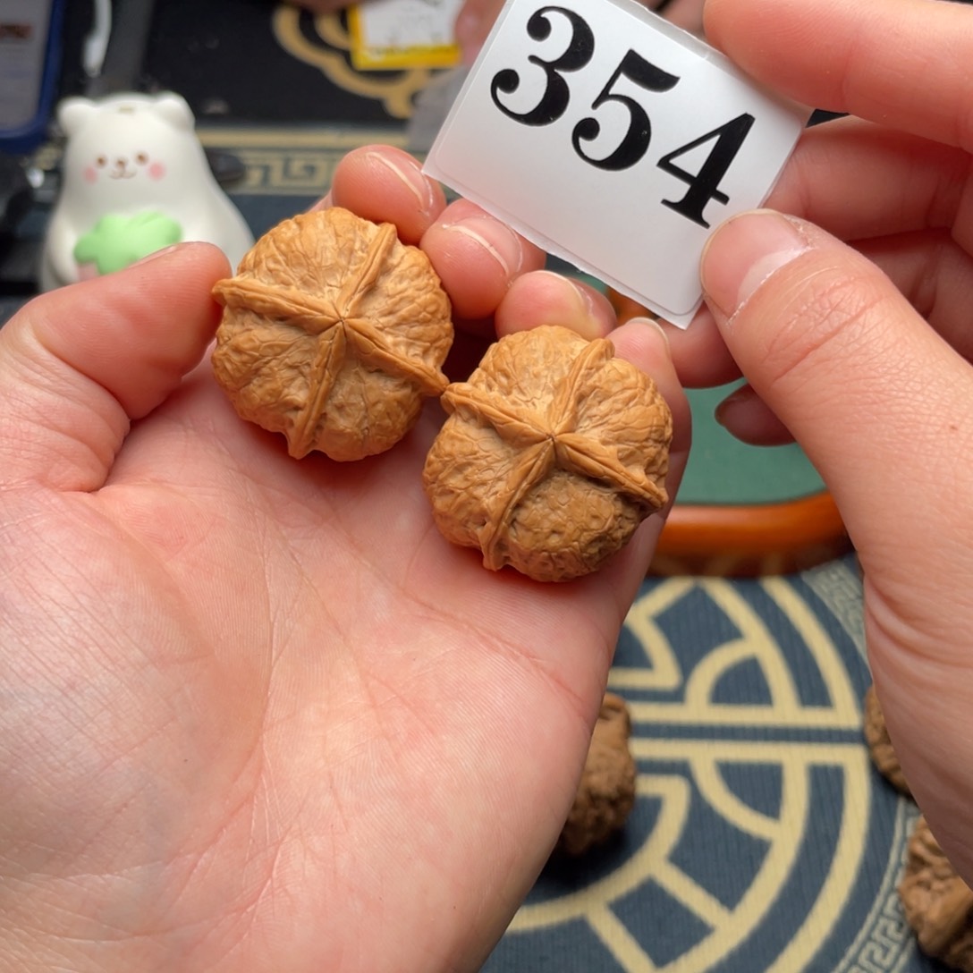 桃核吊坠我****里33四棱354号……