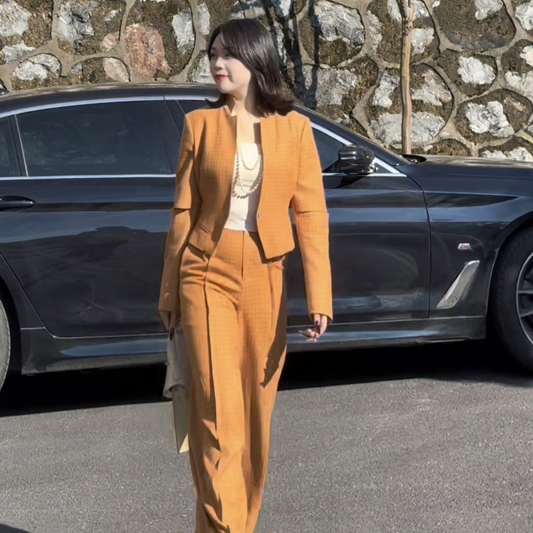 橘色高定长袖套装