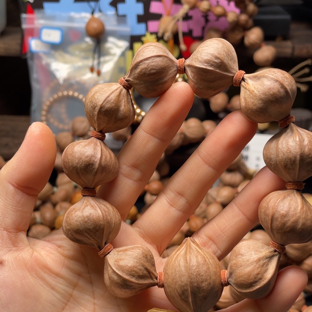 长***安吊坠橄榄核2626四花铁核