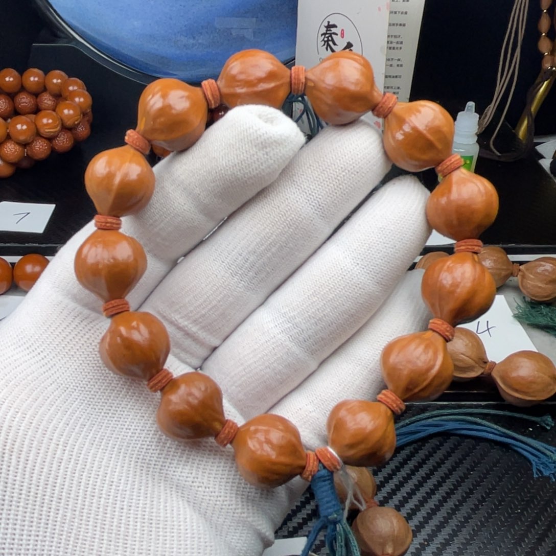 手串橄榄核于*南山小红核1.7蜜桃臀