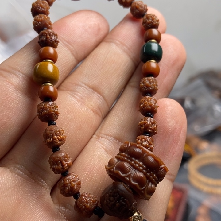 橄榄核吊坠我**静你说吧怎么