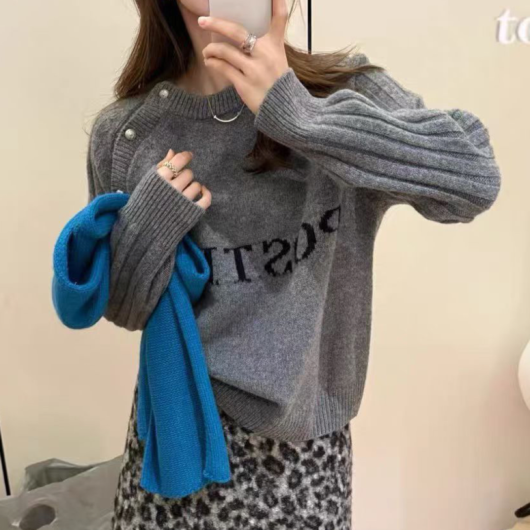 韩版气质设计感宽松圆领100%羊毛毛衣女2025冬季新时尚百搭上衣潮