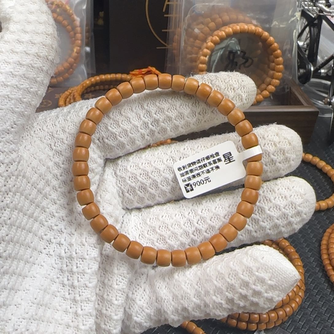 橄榄核吊坠王**?6.0mm老挝核尖直切单圈