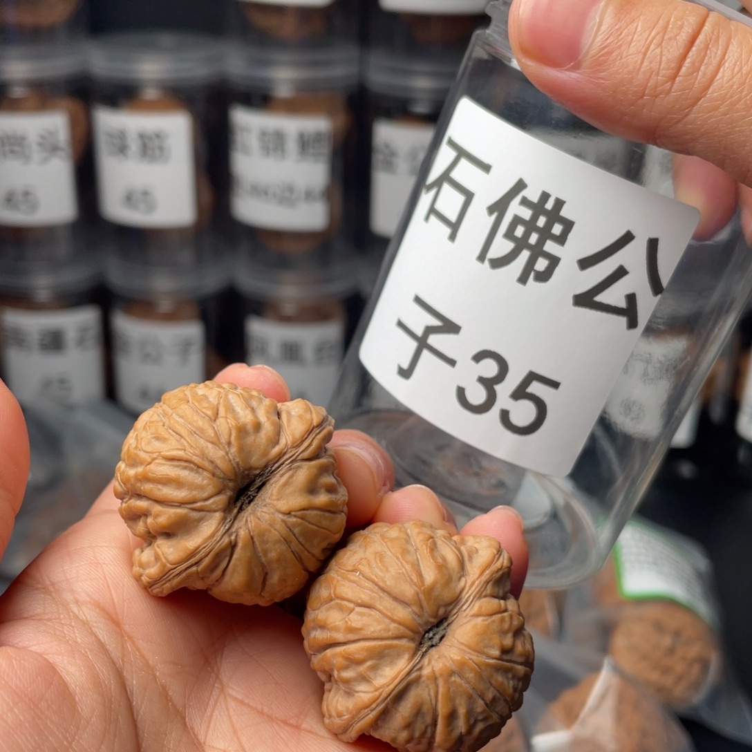 H***.文玩核桃把件全品石佛公子