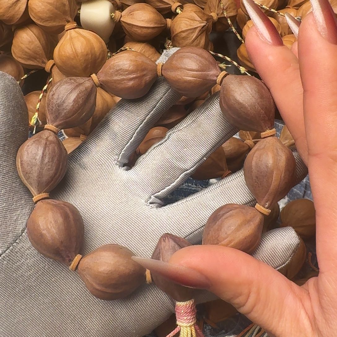 橄榄核把件紫皮核