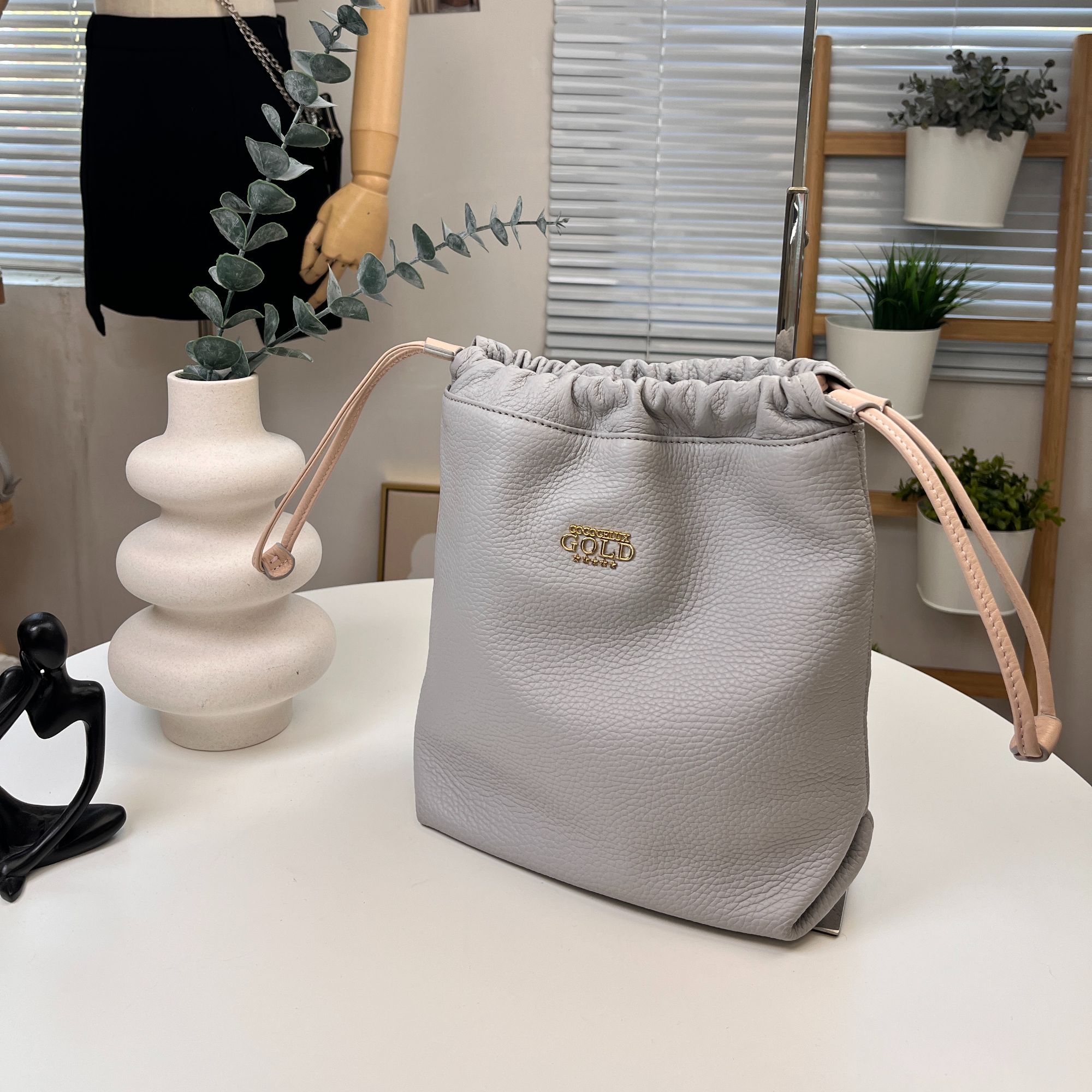 水桶包荔枝纹抽绳包外贸出口原单