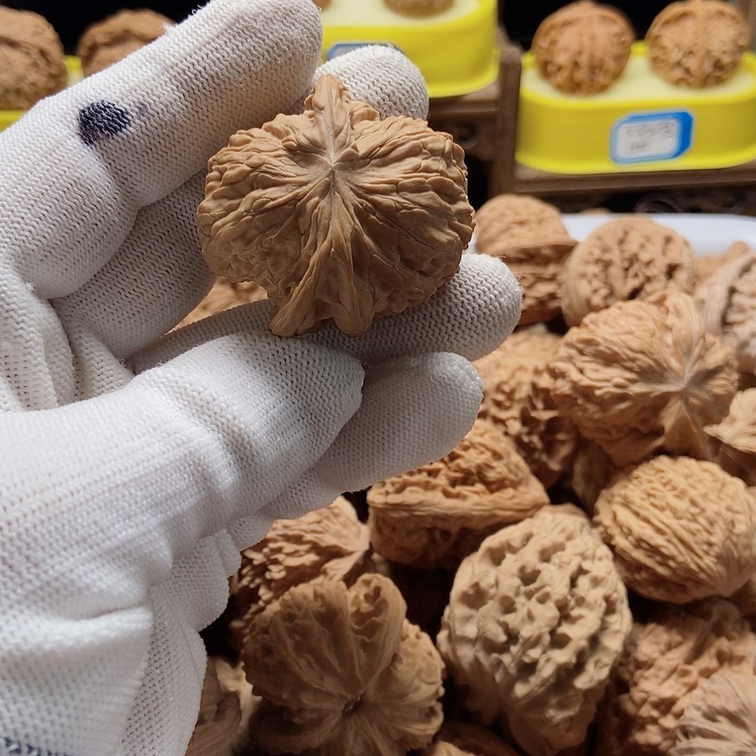 文***博文玩核桃吊坠磨盘