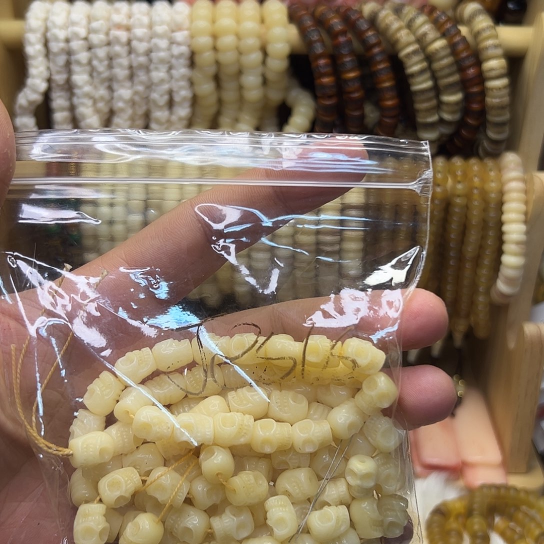暴***节把件桃核0.9驼牙雕刻单圈