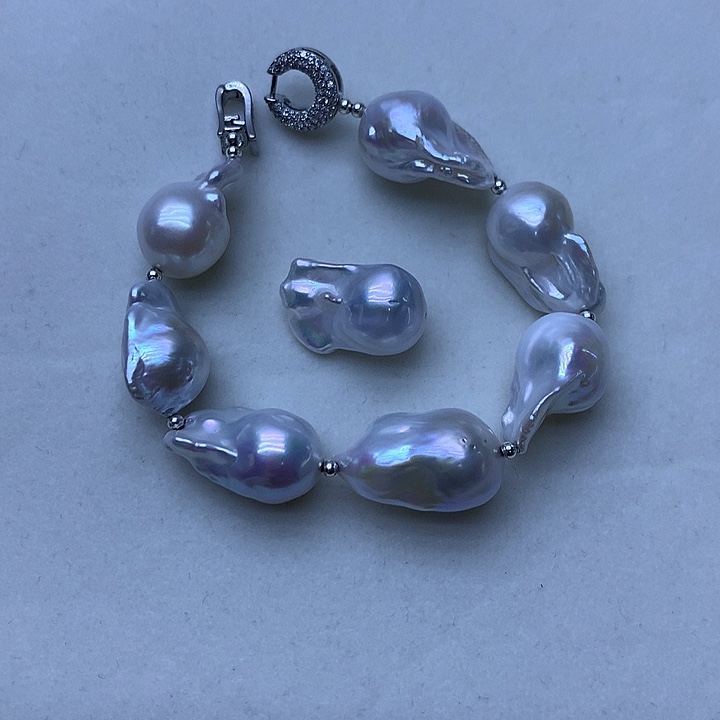 银S925镶嵌淡水珍珠耳饰天****灵