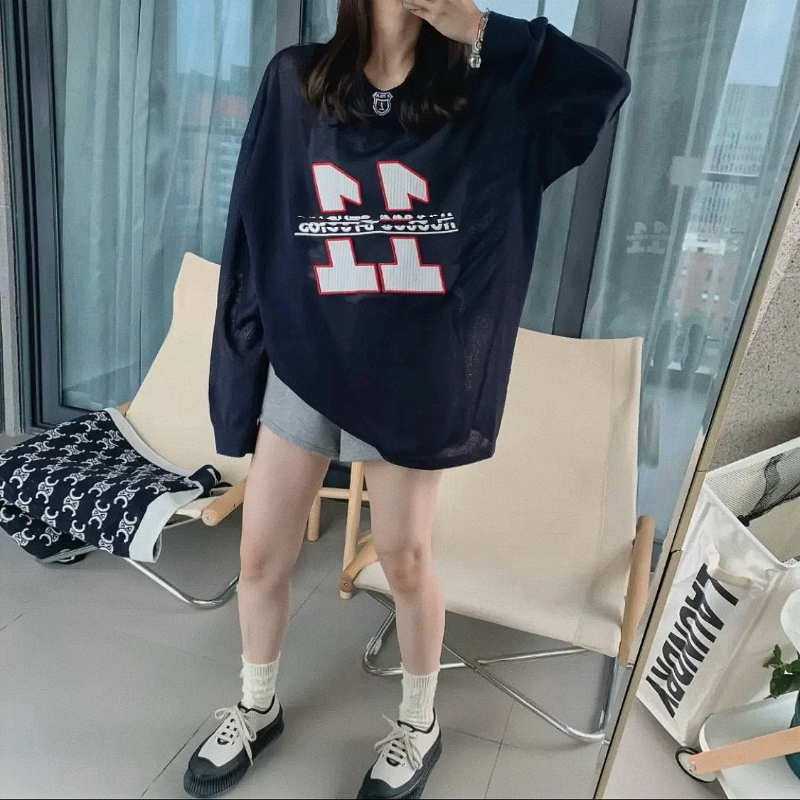 1029打破季节界限 球号潮牌刺绣 长袖针织冰丝空点衫