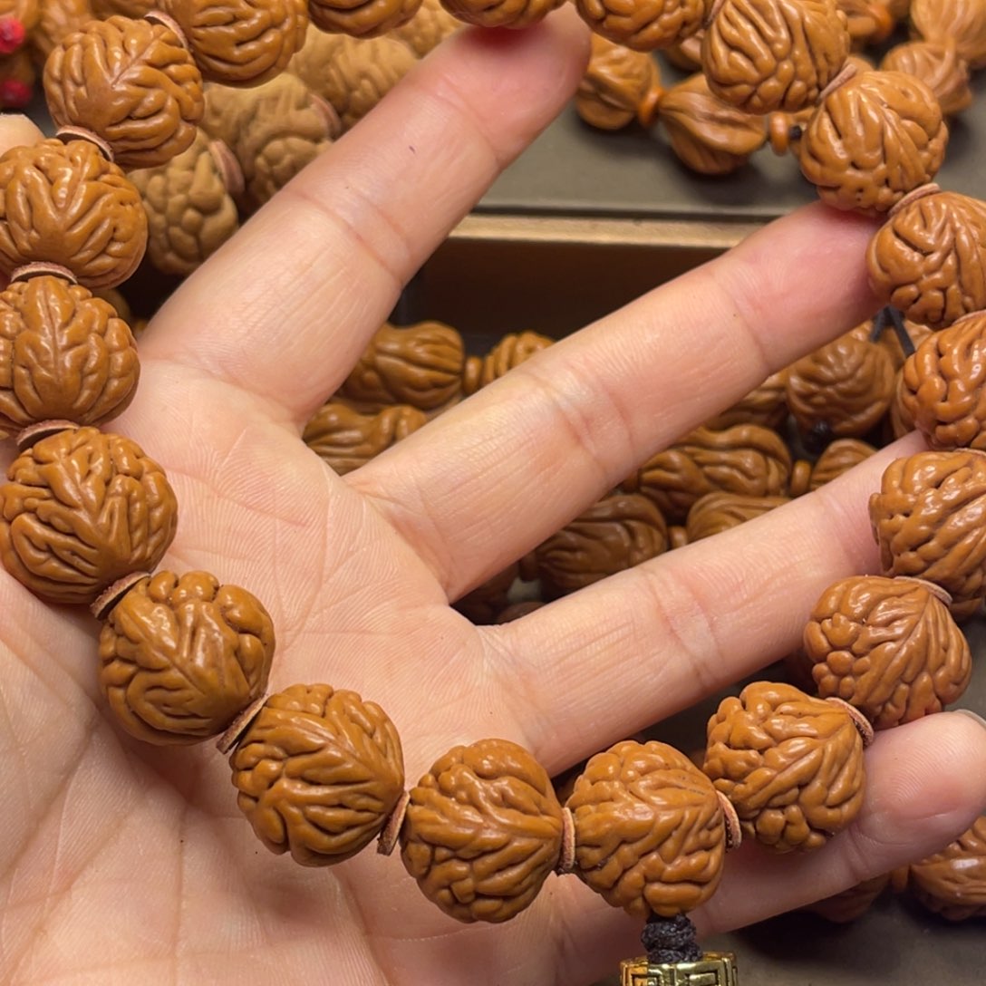 锦***轩手串桃核龙纹桃核3