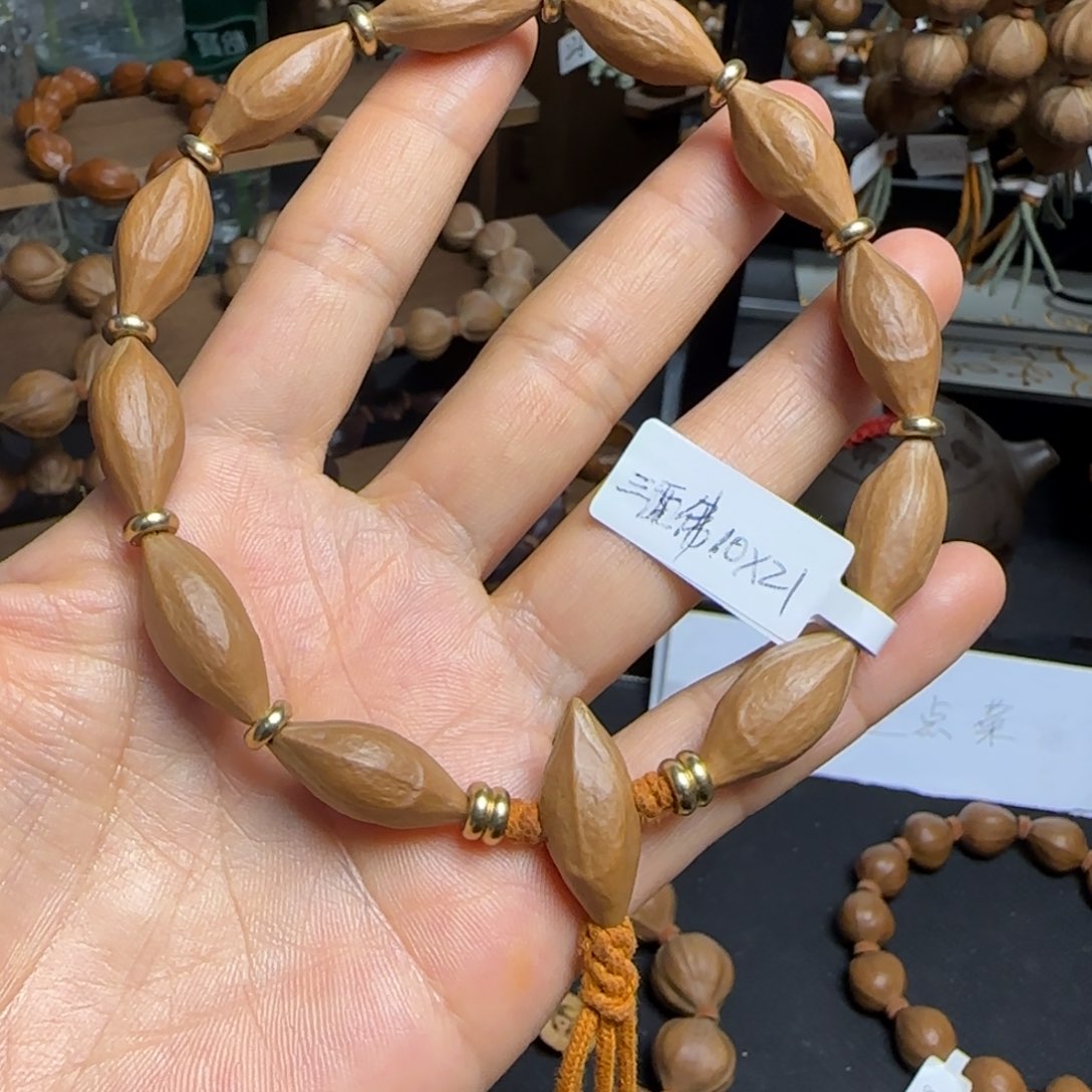 手串/手链橄榄核005。  10*21三面佛。