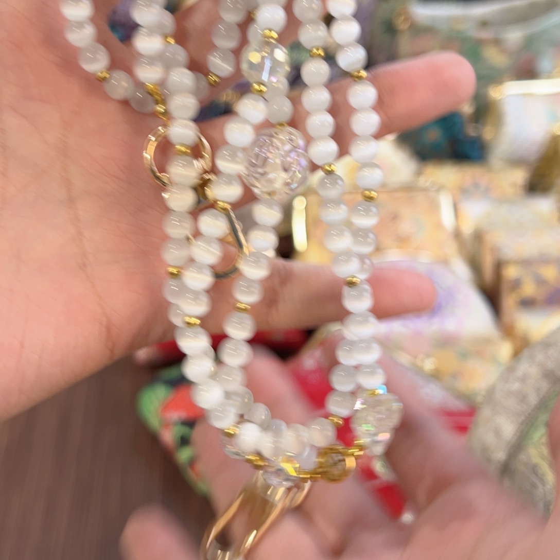 x***n织绣猫眼石链条福利不退换