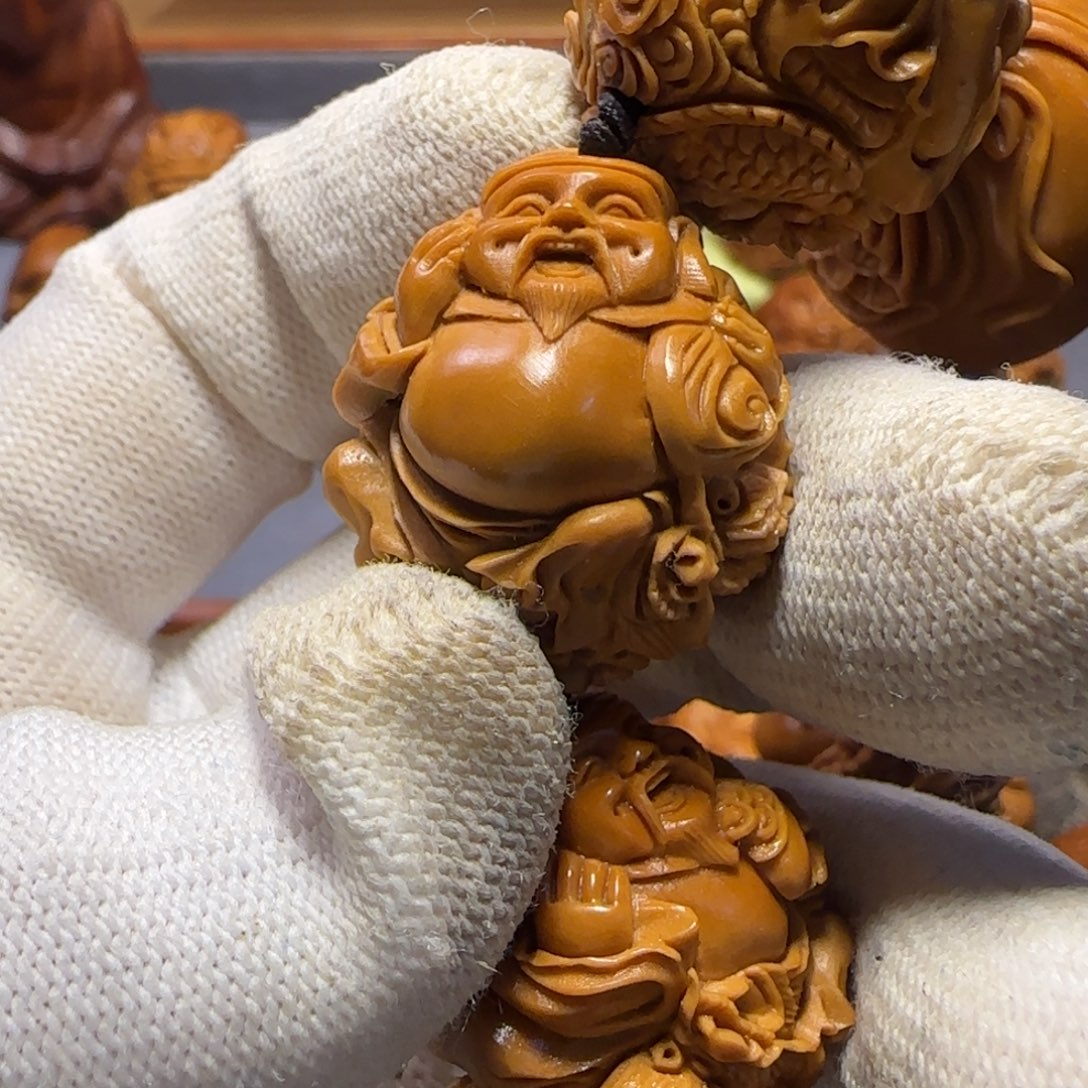 橄榄核吊坠迁***人……………………