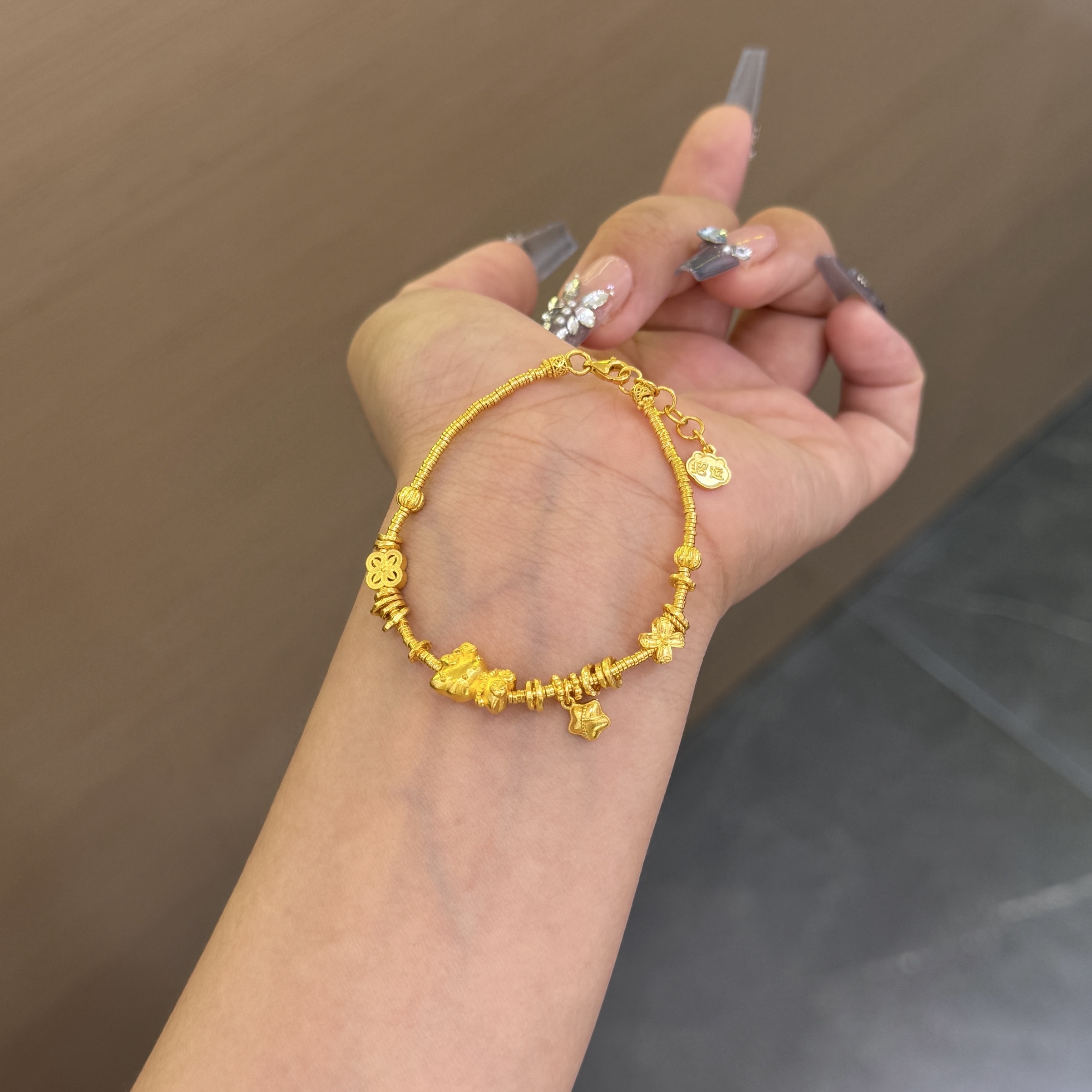 【菠萝珠宝】足金999 简约kt猫咪五角星手链  金重：12.64克