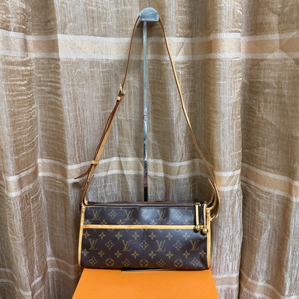 95新 LouisVuitton/路易威登 老花金球三角斜挎包 鱼鱼