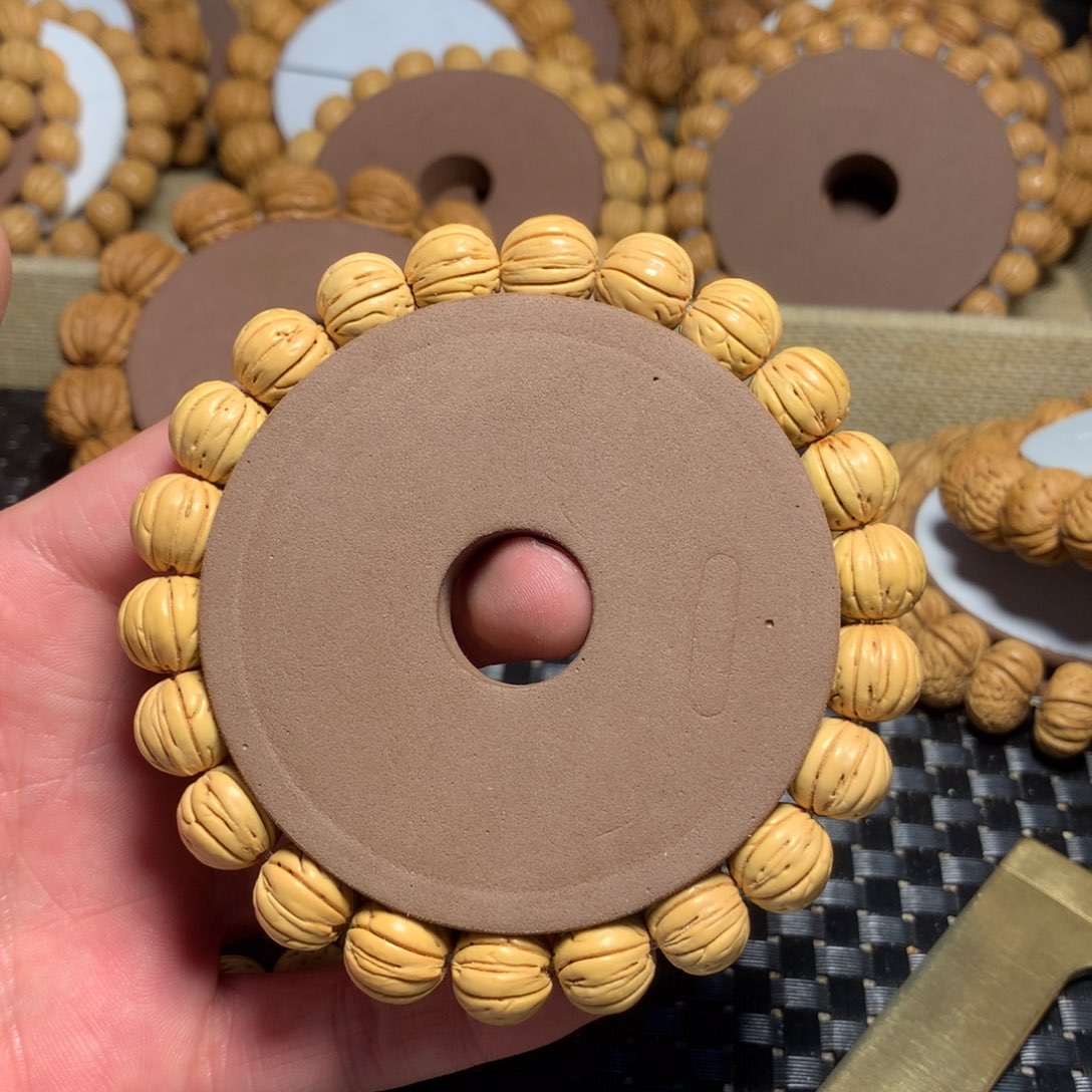 桃核手串八***尼黄桃小金豆