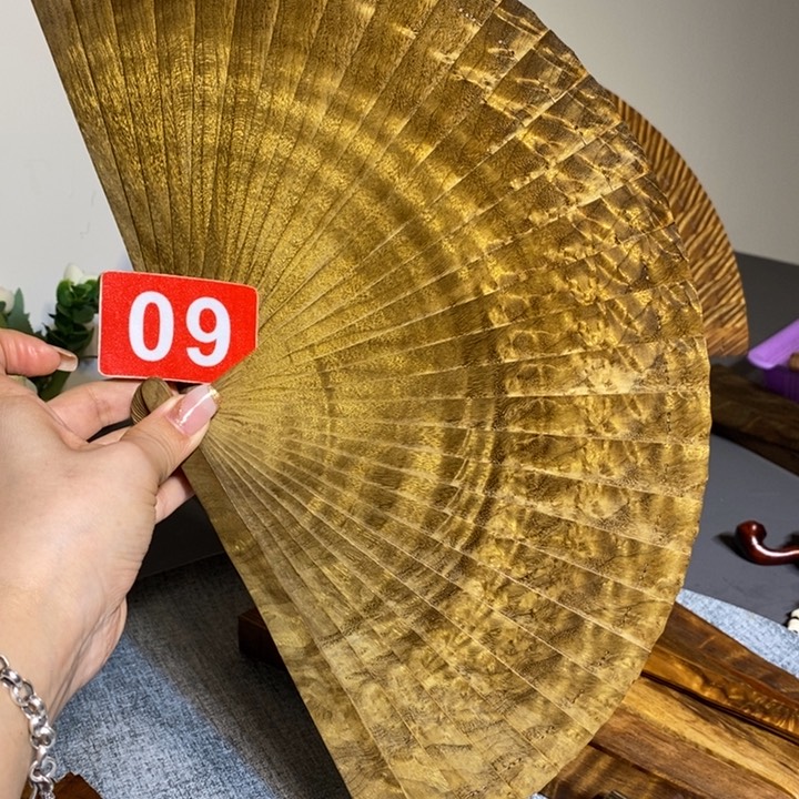 金丝楠流**球金丝楠木扇子