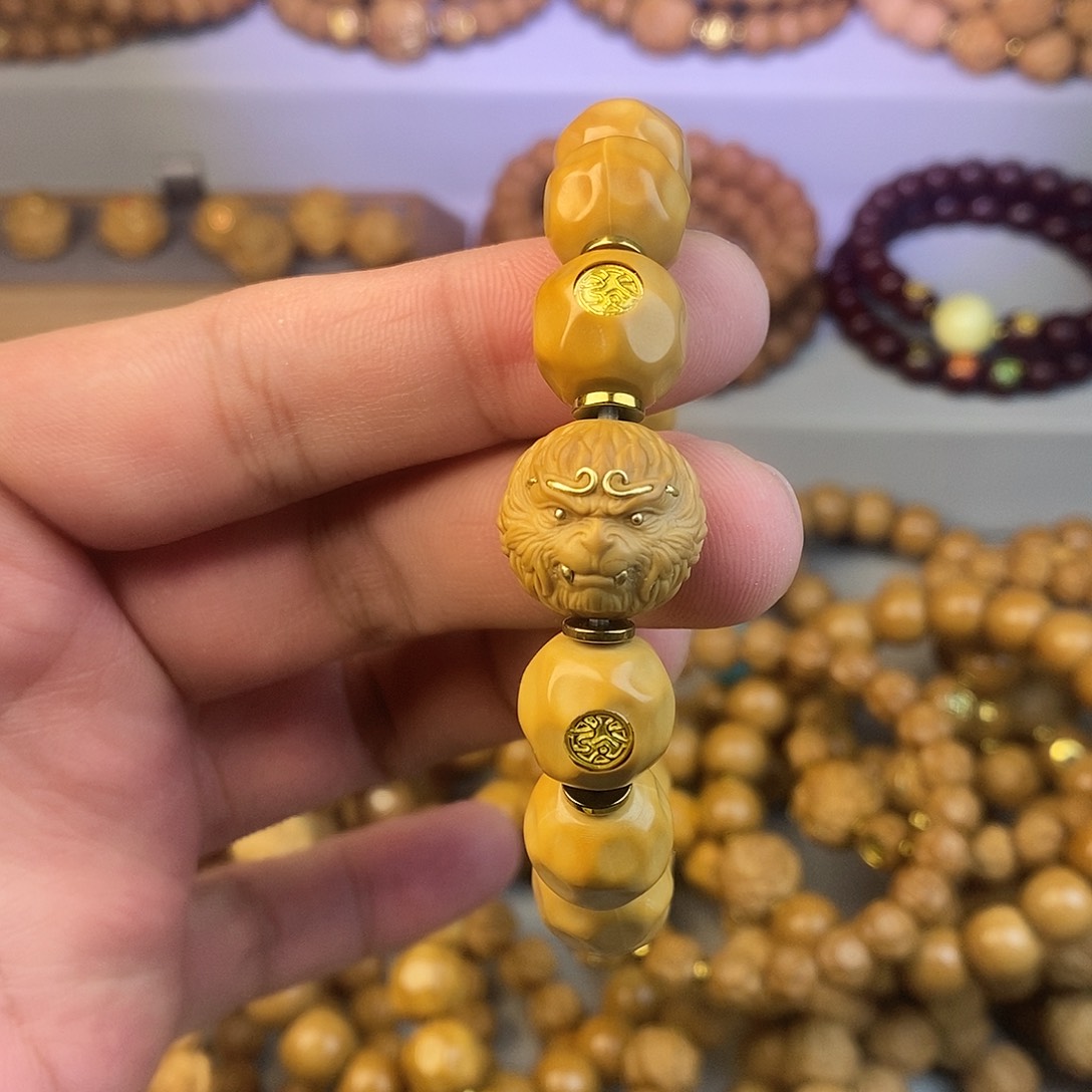 湖***军手串猴头核桃全品奶酪大圣