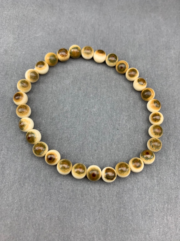 SX0356天然猛犸牙 蓝眼圆珠7mm设计款单圈手串