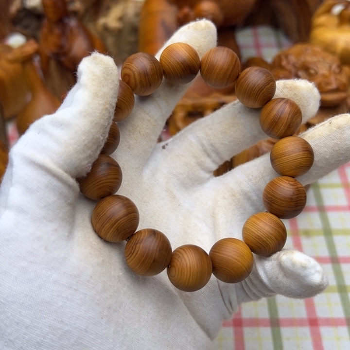 曾***我柏木（崖柏）陈化老料手串把件 