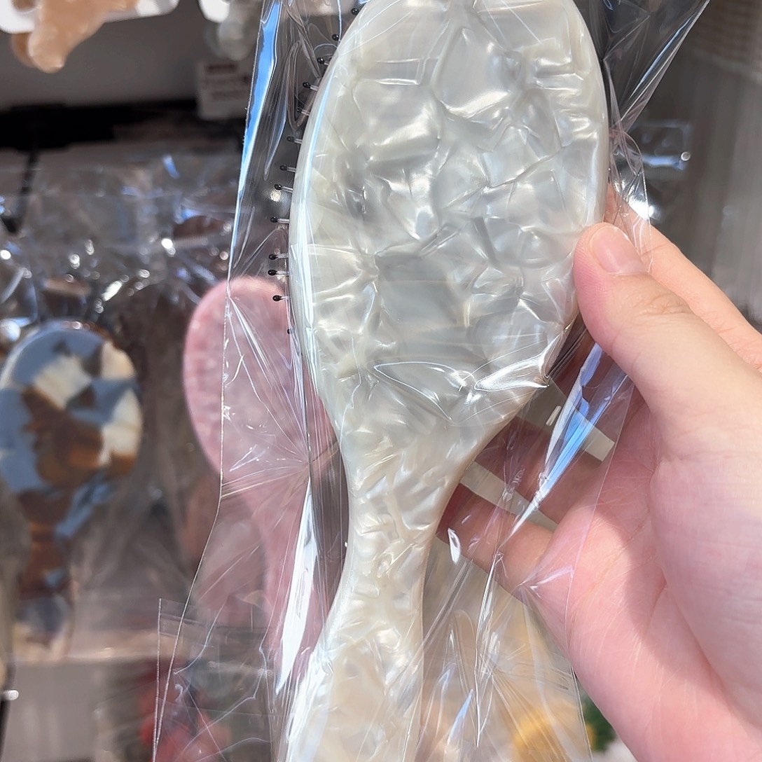 铁合金布艺鬃毛梳子一个