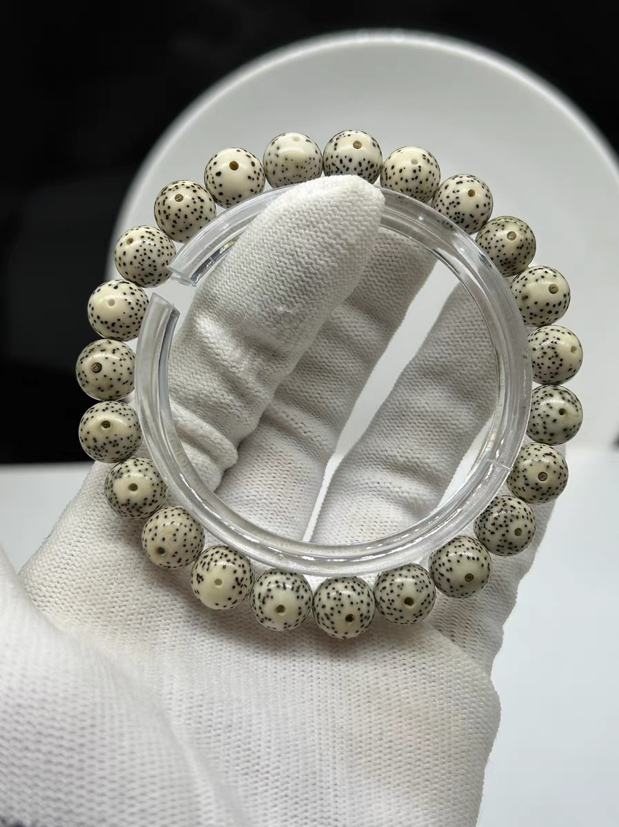 精品级海南星月菩提石玉料10X10圆珠双留白小细星单圈手串