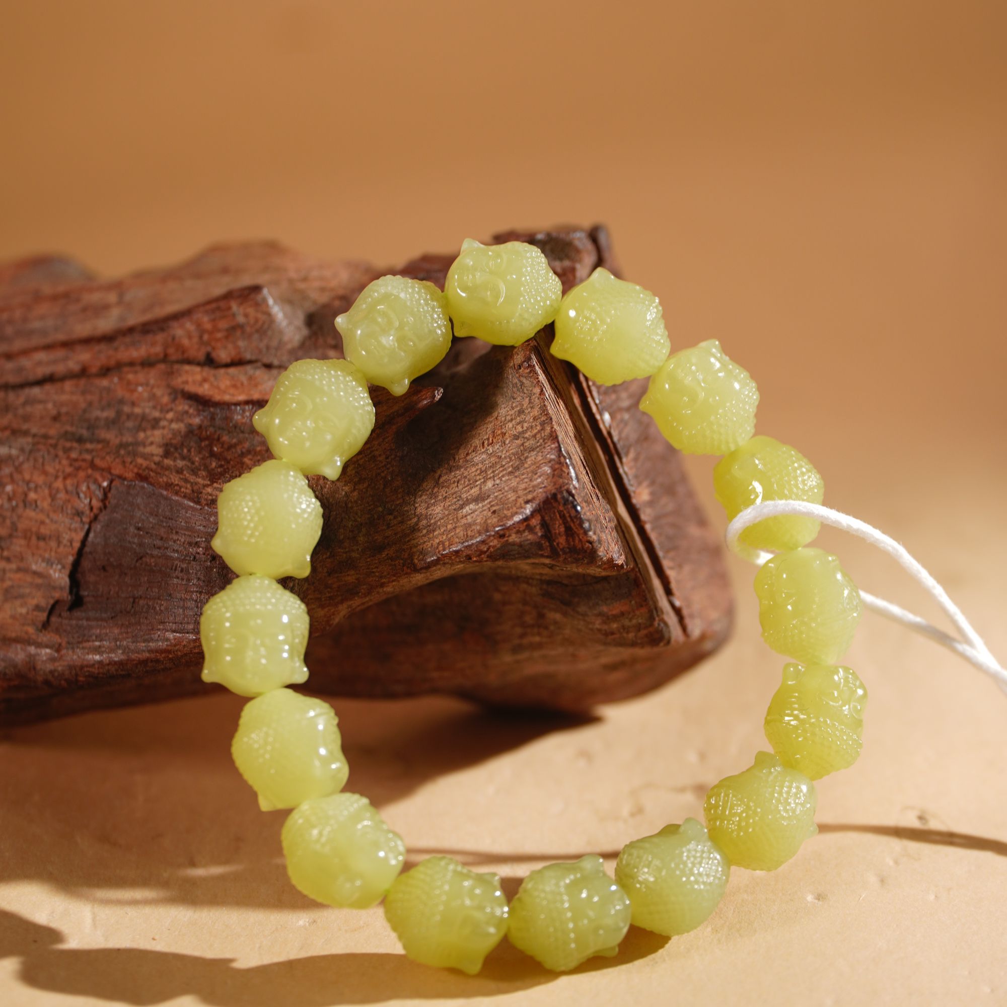 HT130079和田玉黄口佛首手串