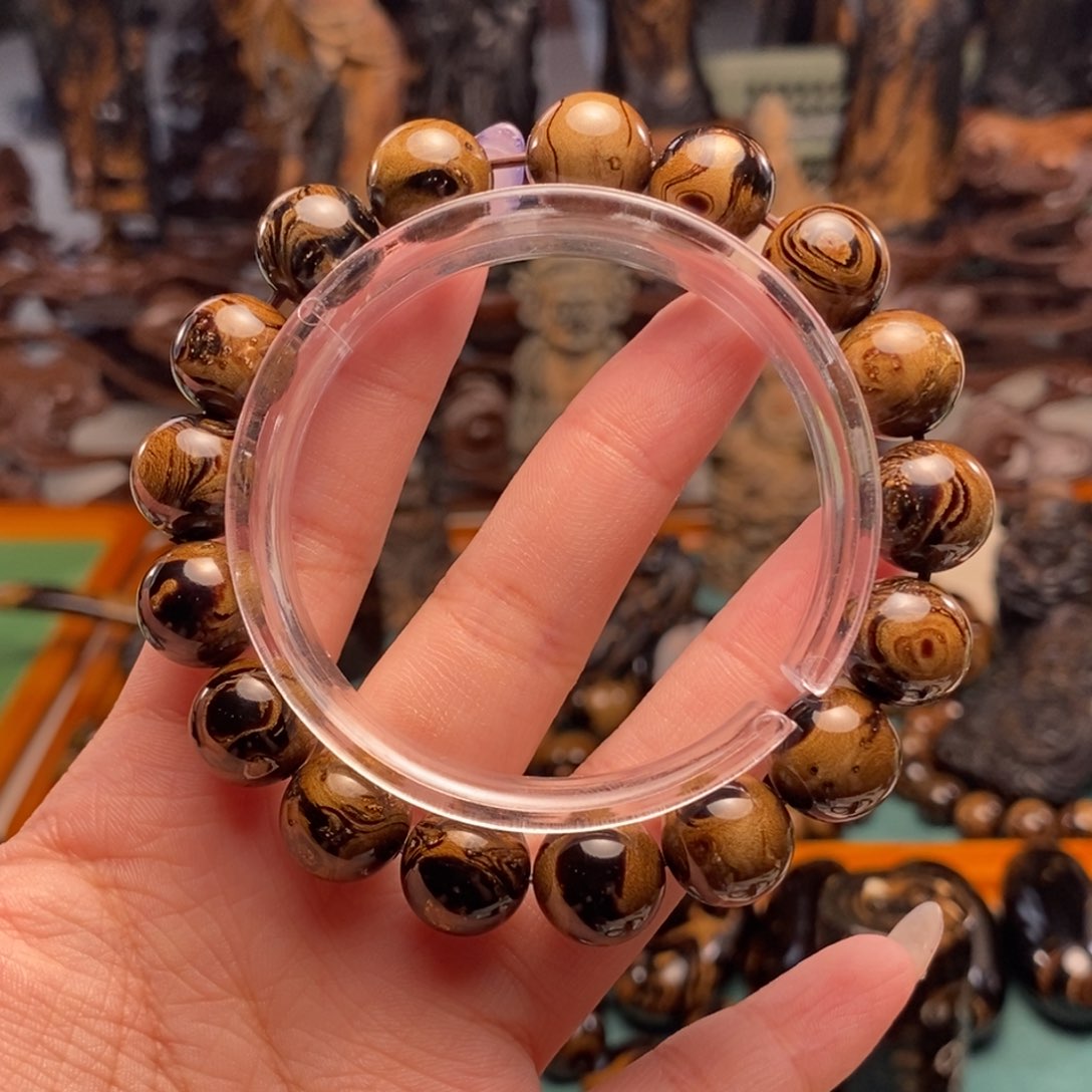 文玩小六子 手串1.2圆珠 棕妖 微微瑕