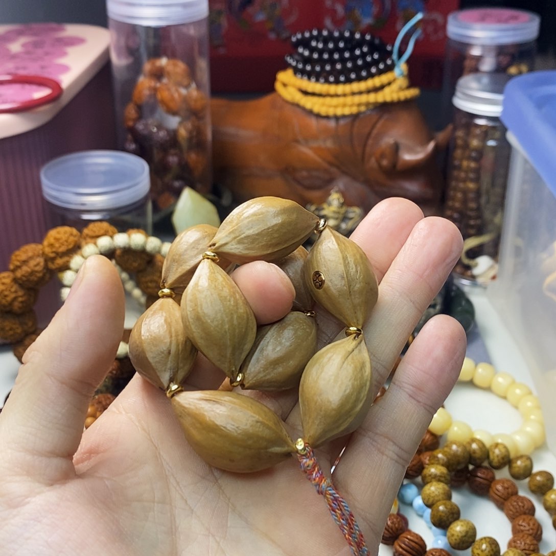 橄榄核吊坠铁核手持