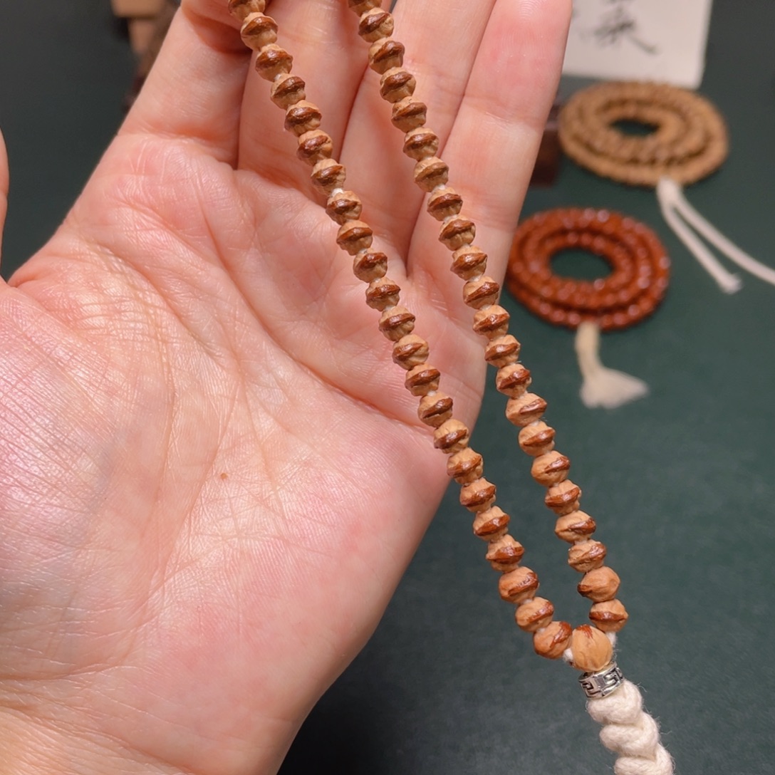 吊坠柏香籽/百香籽小凤眼手持