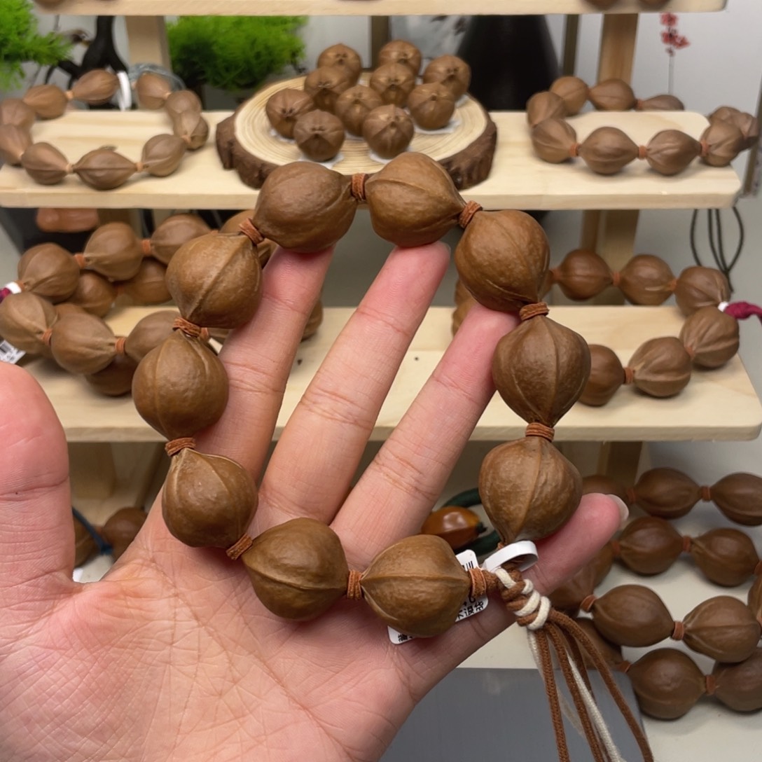 司***落手串/手链橄榄核22*26梅林铁核