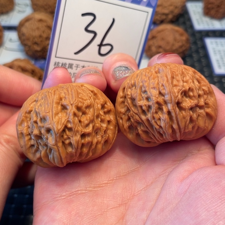 桃核把件40磨盘36。。。