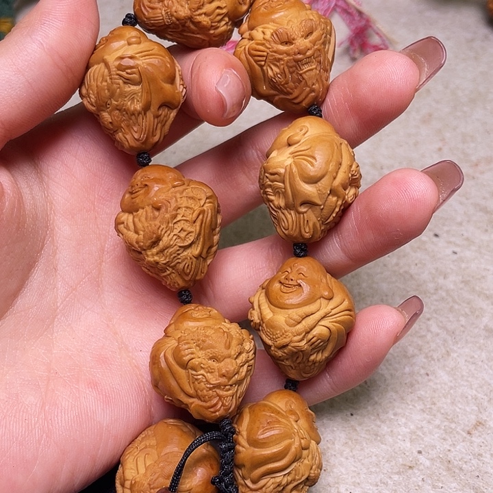 米***淋橄榄核吊坠橄榄核
