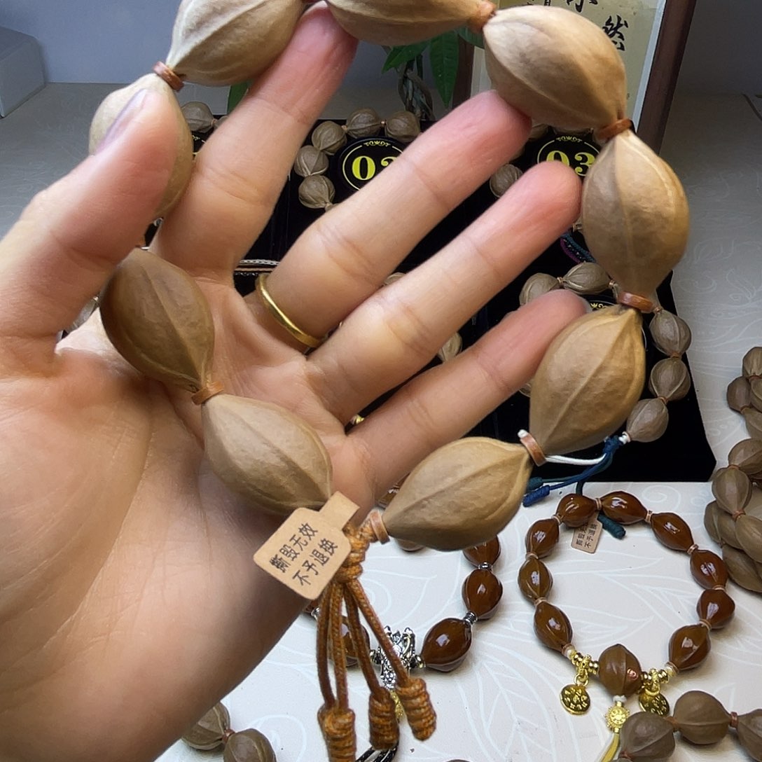 郭***i手串橄榄核梅林铁核19*31