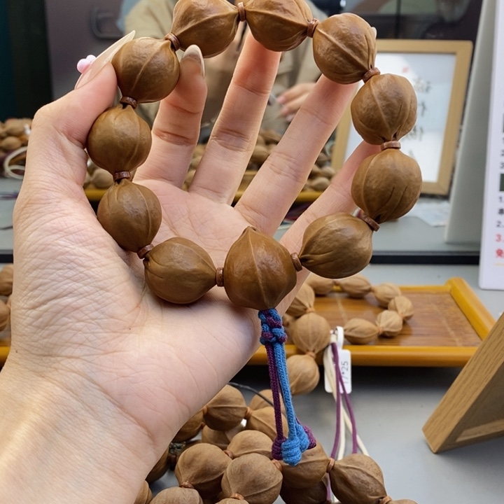 吊坠橄榄核落****辰梅林铁