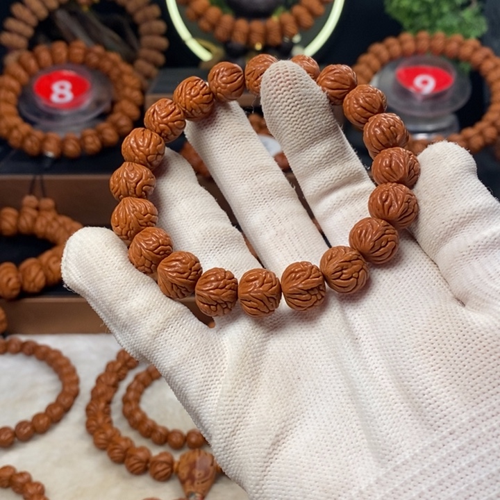 桃核吊坠3*。秦岭龙纹