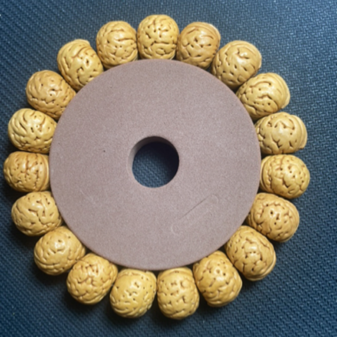 桃核纽扣：嘎嘎板正