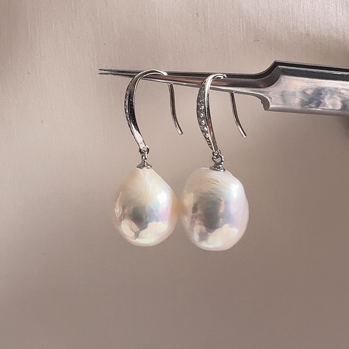 麦***兜淡水珍珠耳饰银S925镶嵌大圆巴耳钩