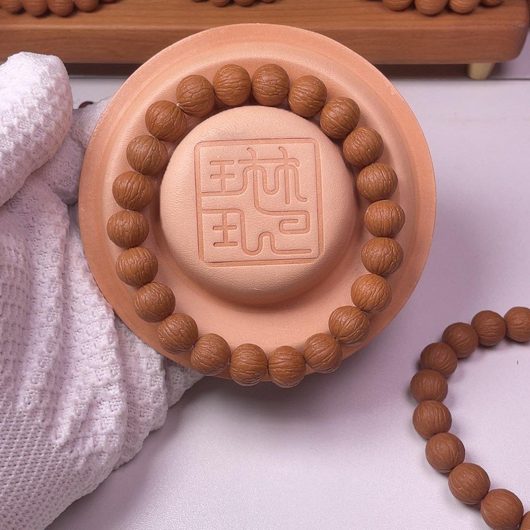 陛***下猴头核桃吊坠凤羽（蓝天）