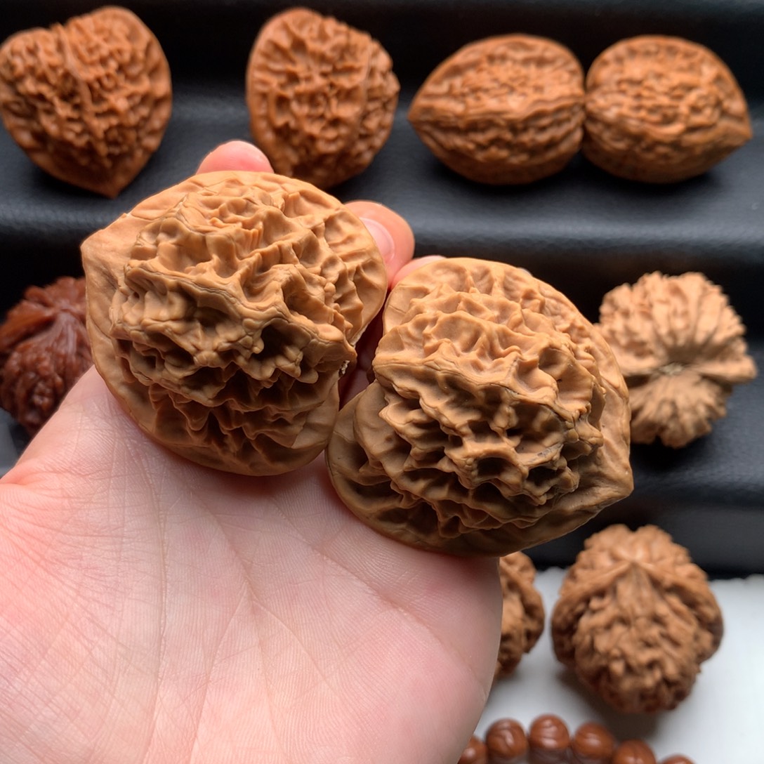 脆****文玩核桃把件大花