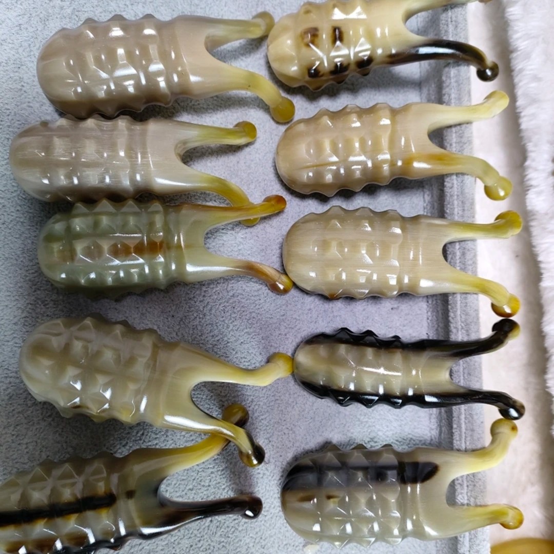 牛角美鼻器实心带砖美鼻器刮鼻子耳朵手把件便携发梳