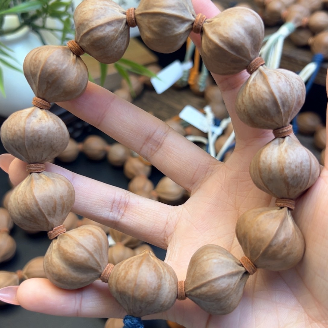 手串橄榄核001 24×23四花