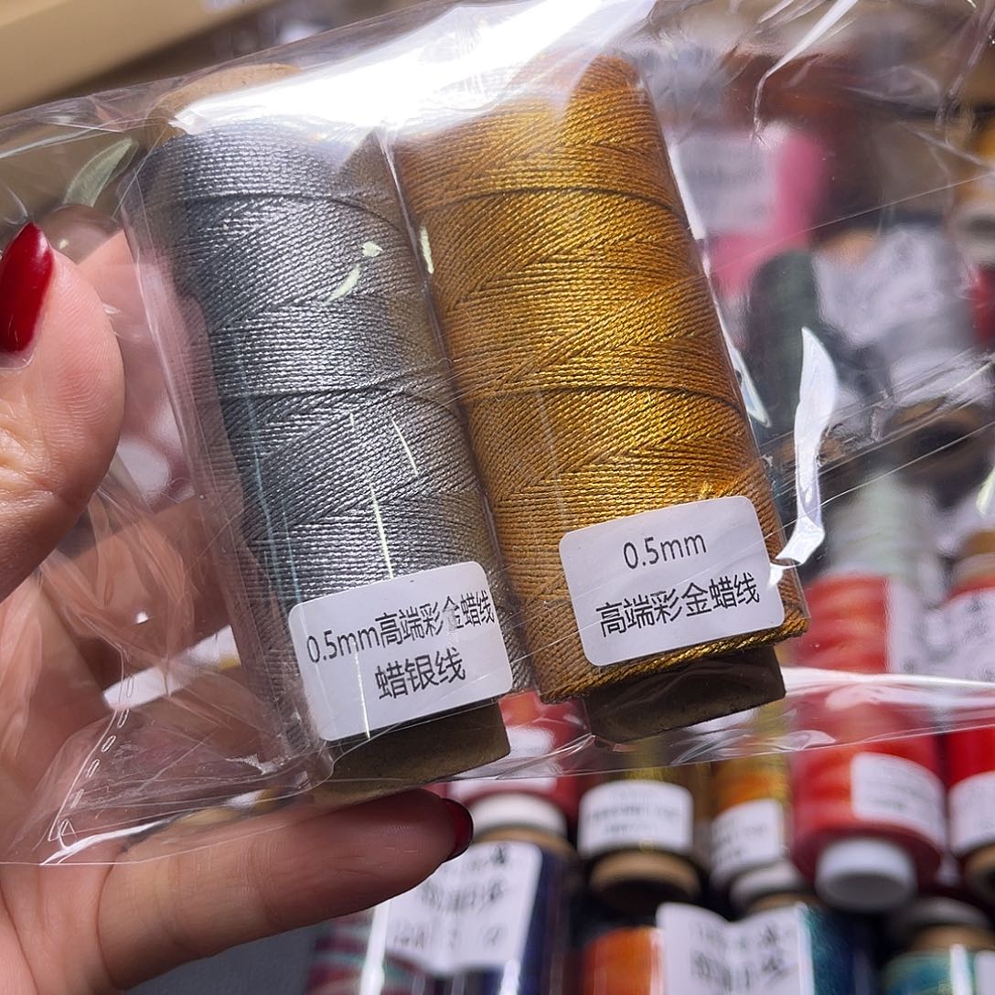 0.5彩金蜡金银各一卷