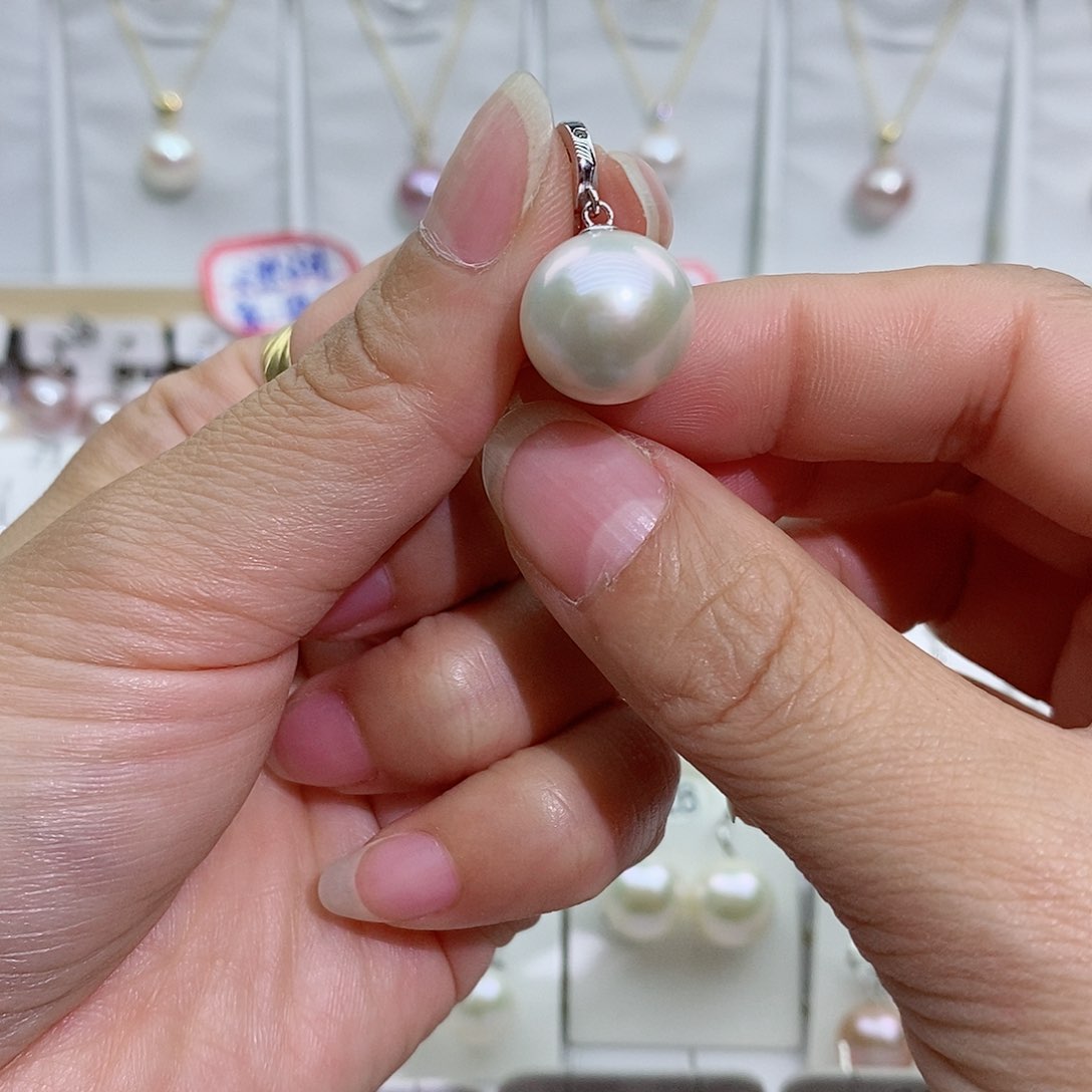 淡水珍珠银S925镶嵌吊坠(赠链)低****?