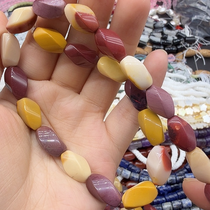未镶嵌珠宝半成品水晶8×15淡黄钮珠一条