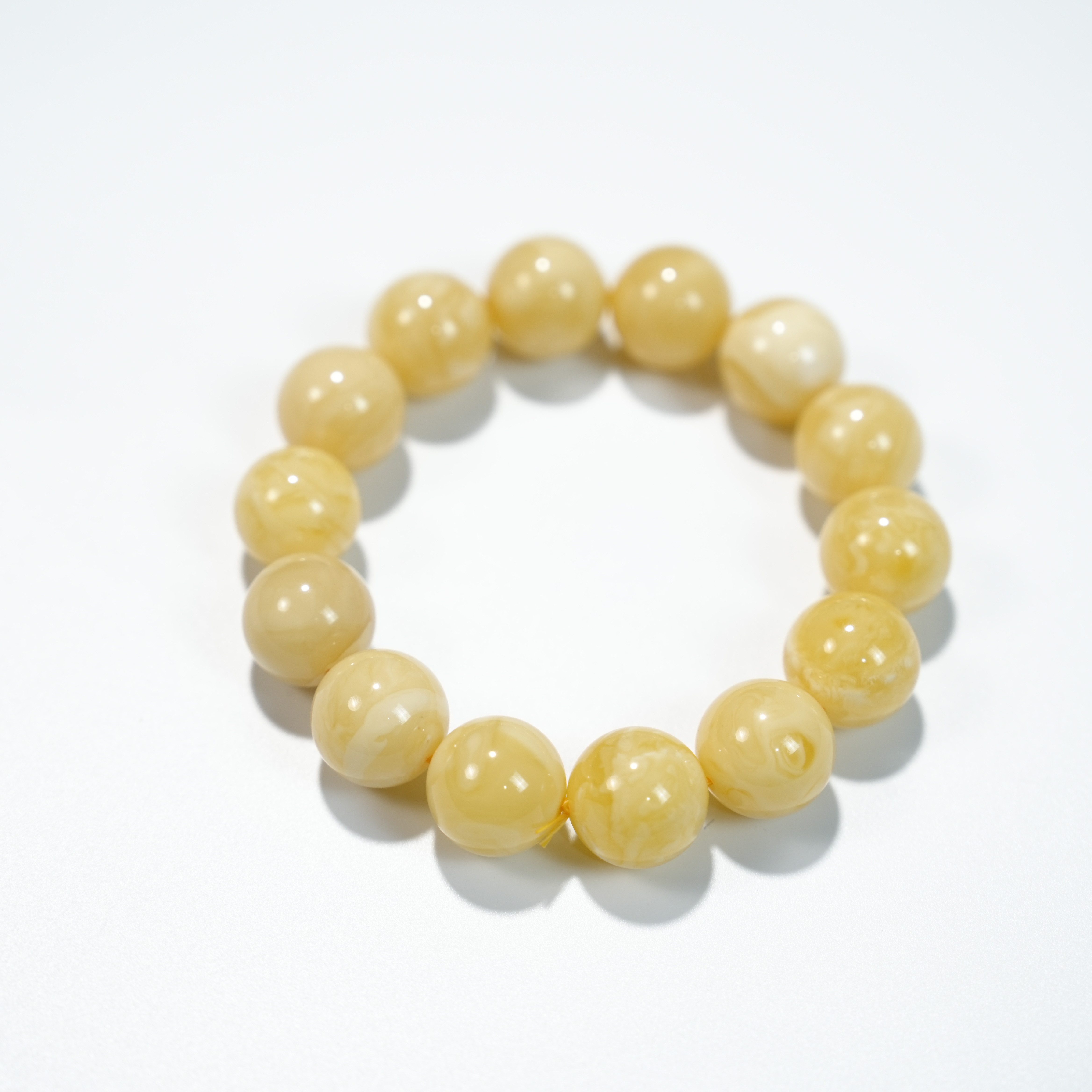 蜜蜡1.5*14颗单圈手串35020188