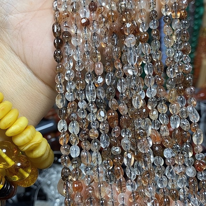 玛瑙/玉髓未镶嵌珠宝半成品天然高透黑金超七一条